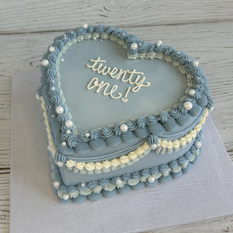 Baby Blue and White Heart-Shaped Cake