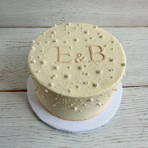 Elegant Cake with Pearls and Initials