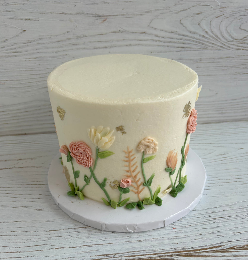 Simple Flowers with Gold Leaf Accents Cake