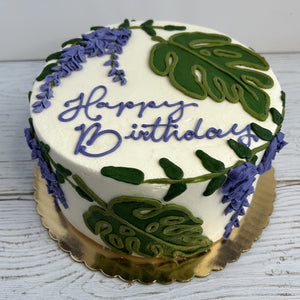 Monstera Leaf Cake with Wisteria Flowers